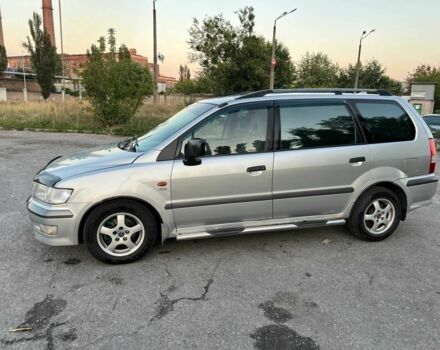 Серый Мицубиси Спейс Вагон, объемом двигателя 2.4 л и пробегом 415 тыс. км за 2750 $, фото 1 на Automoto.ua