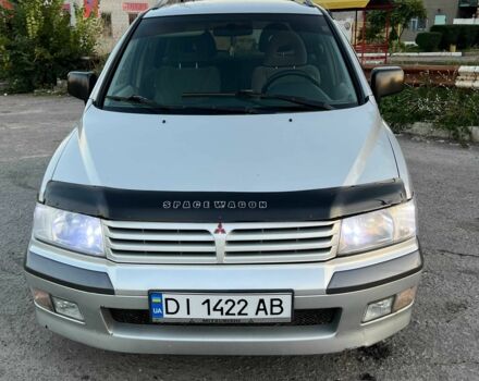 Серый Мицубиси Спейс Вагон, объемом двигателя 2.4 л и пробегом 415 тыс. км за 2750 $, фото 2 на Automoto.ua