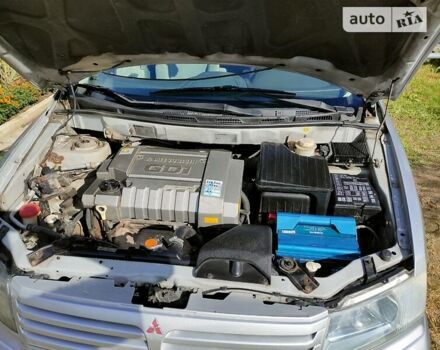 Сірий Міцубісі Спейс Вагон, об'ємом двигуна 2.4 л та пробігом 323 тис. км за 4000 $, фото 13 на Automoto.ua