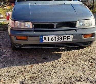 Серый Мицубиси Спейс Вагон, объемом двигателя 1.8 л и пробегом 410 тыс. км за 2000 $, фото 1 на Automoto.ua