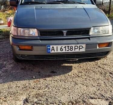 Серый Мицубиси Спейс Вагон, объемом двигателя 1.8 л и пробегом 410 тыс. км за 2000 $, фото 1 на Automoto.ua