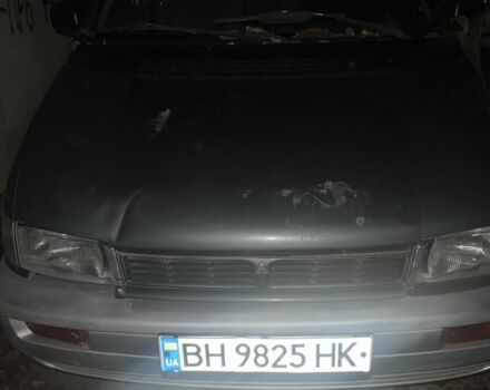 Серый Мицубиси Спейс Вагон, объемом двигателя 1.8 л и пробегом 300 тыс. км за 1500 $, фото 1 на Automoto.ua