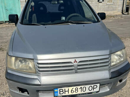 Сірий Міцубісі Спейс Вагон, об'ємом двигуна 2 л та пробігом 294 тис. км за 4700 $, фото 1 на Automoto.ua