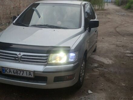 Серый Мицубиси Спейс Вагон, объемом двигателя 2 л и пробегом 3 тыс. км за 4120 $, фото 1 на Automoto.ua