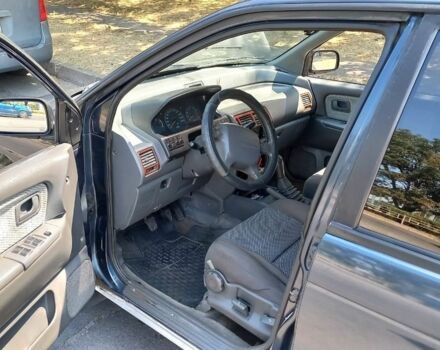 Синий Мицубиси Спейс Вагон, объемом двигателя 2 л и пробегом 400 тыс. км за 2500 $, фото 3 на Automoto.ua