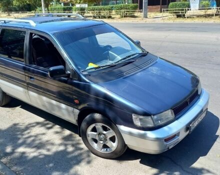 Синий Мицубиси Спейс Вагон, объемом двигателя 2 л и пробегом 400 тыс. км за 2500 $, фото 1 на Automoto.ua