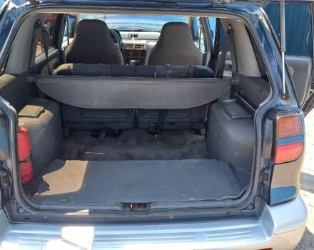 Синий Мицубиси Спейс Вагон, объемом двигателя 2 л и пробегом 400 тыс. км за 2500 $, фото 4 на Automoto.ua