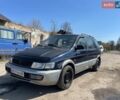 Синий Мицубиси Спейс Вагон, объемом двигателя 2 л и пробегом 370 тыс. км за 1250 $, фото 1 на Automoto.ua