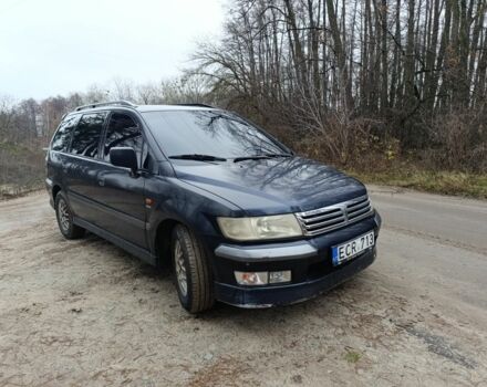 Синий Мицубиси Спейс Вагон, объемом двигателя 2.4 л и пробегом 333 тыс. км за 1000 $, фото 3 на Automoto.ua