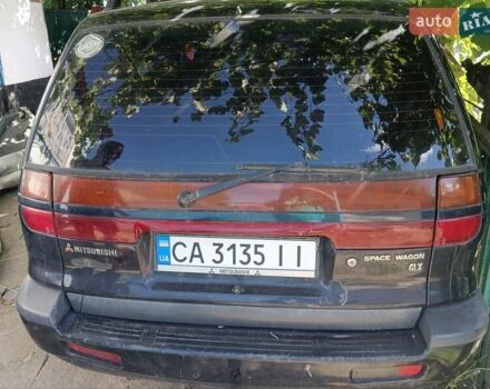Мицубиси Спейс Вагон 2000 в Тальном на Automoto.ua Синий Мицубиси Спейс Вагон, объемом двигателя 2 л и пробегом 302 тыс. км за 1700 $, фото 4 на Automoto.ua