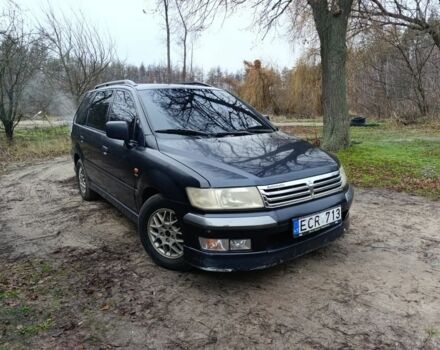 Синий Мицубиси Спейс Вагон, объемом двигателя 2.4 л и пробегом 333 тыс. км за 1000 $, фото 2 на Automoto.ua