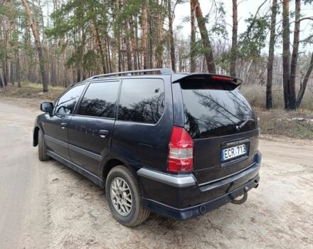 Синий Мицубиси Спейс Вагон, объемом двигателя 2.4 л и пробегом 333 тыс. км за 1000 $, фото 5 на Automoto.ua