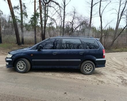 Синий Мицубиси Спейс Вагон, объемом двигателя 2.4 л и пробегом 333 тыс. км за 1000 $, фото 4 на Automoto.ua