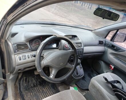 Синий Мицубиси Спейс Вагон, объемом двигателя 2.4 л и пробегом 333 тыс. км за 1000 $, фото 6 на Automoto.ua