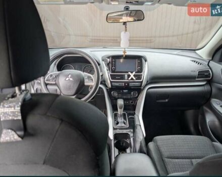 Білий Міцубісі Eclipse Cross, об'ємом двигуна 1.5 л та пробігом 140 тис. км за 14000 $, фото 12 на Automoto.ua