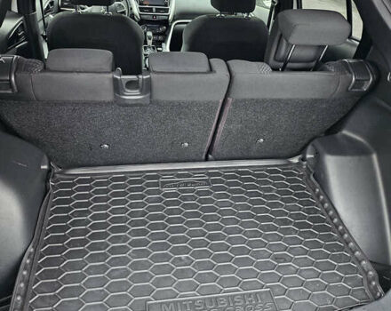 Белый Мицубиси Eclipse Cross, объемом двигателя 1.5 л и пробегом 187 тыс. км за 13999 $, фото 12 на Automoto.ua