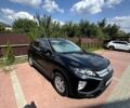 Черный Мицубиси Eclipse Cross, объемом двигателя 1.5 л и пробегом 104 тыс. км за 17500 $, фото 1 на Automoto.ua