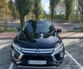 Черный Мицубиси Eclipse Cross, объемом двигателя 1.5 л и пробегом 145 тыс. км за 15000 $, фото 1 на Automoto.ua