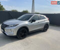 Серый Мицубиси Eclipse Cross, объемом двигателя 1.5 л и пробегом 124 тыс. км за 14900 $, фото 1 на Automoto.ua