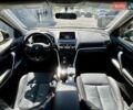 Серый Мицубиси Eclipse Cross, объемом двигателя 1.5 л и пробегом 104 тыс. км за 18900 $, фото 55 на Automoto.ua