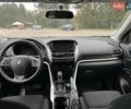 Сірий Міцубісі Eclipse Cross, об'ємом двигуна 1.5 л та пробігом 129 тис. км за 14900 $, фото 19 на Automoto.ua