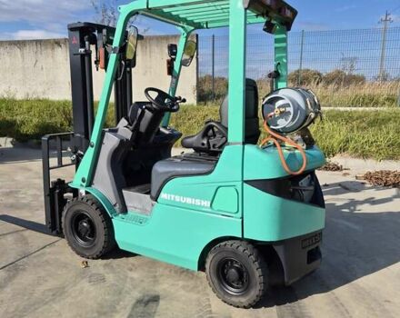 Зеленый Мицубиси FGE, объемом двигателя 2 л и пробегом 5 тыс. км за 12045 $, фото 1 на Automoto.ua