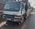 Белый Мицубиси Fuso Canter, объемом двигателя 3.91 л и пробегом 595 тыс. км за 6500 $, фото 1 на Automoto.ua