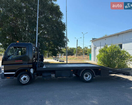 Черный Мицубиси Fuso Canter, объемом двигателя 2.98 л и пробегом 388 тыс. км за 11500 $, фото 2 на Automoto.ua
