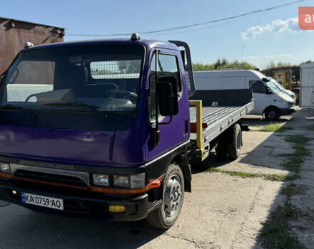 Фиолетовый Мицубиси Fuso Canter, объемом двигателя 3.91 л и пробегом 100 тыс. км за 12300 $, фото 4 на Automoto.ua