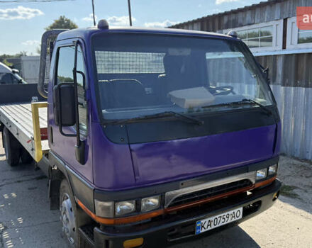 Фиолетовый Мицубиси Fuso Canter, объемом двигателя 3.91 л и пробегом 100 тыс. км за 12300 $, фото 3 на Automoto.ua