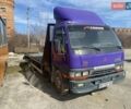 Фиолетовый Мицубиси Fuso Canter, объемом двигателя 3.9 л и пробегом 680 тыс. км за 13500 $, фото 2 на Automoto.ua