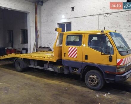 Желтый Мицубиси Fuso Canter, объемом двигателя 3.91 л и пробегом 300 тыс. км за 5200 $, фото 1 на Automoto.ua