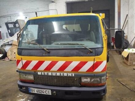 Желтый Мицубиси Fuso Canter, объемом двигателя 3.91 л и пробегом 300 тыс. км за 5200 $, фото 1 на Automoto.ua