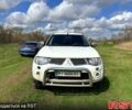 Белый Мицубиси L200, объемом двигателя 2.5 л и пробегом 230 тыс. км за 15600 $, фото 2 на Automoto.ua