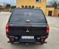 Черный Мицубиси L200, объемом двигателя 2.5 л и пробегом 260 тыс. км за 2700 $, фото 4 на Automoto.ua