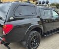 Черный Мицубиси L200, объемом двигателя 2.5 л и пробегом 260 тыс. км за 2700 $, фото 3 на Automoto.ua