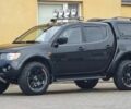 Черный Мицубиси L200, объемом двигателя 2.5 л и пробегом 260 тыс. км за 2700 $, фото 1 на Automoto.ua