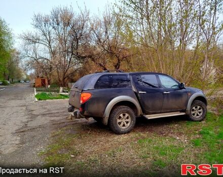 Черный Мицубиси L200, объемом двигателя 2.5 л и пробегом 285 тыс. км за 8000 $, фото 5 на Automoto.ua