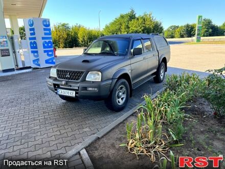 Міцубісі L200 2004 у Смеле на Automoto.ua Синій Міцубісі L200, об'ємом двигуна 2.5 л та пробігом 374 тис. км за 10500 $, фото 1 на Automoto.ua