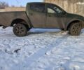 Зеленый Мицубиси L200, объемом двигателя 2.5 л и пробегом 177 тыс. км за 5300 $, фото 1 на Automoto.ua