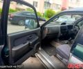 Зеленый Мицубиси L200, объемом двигателя 2.5 л и пробегом 100 тыс. км за 6750 $, фото 1 на Automoto.ua