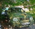 Зеленый Мицубиси L200, объемом двигателя 2.5 л и пробегом 83 тыс. км за 4300 $, фото 1 на Automoto.ua
