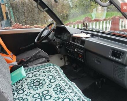 Белый Мицубиси L 300, объемом двигателя 2.5 л и пробегом 365 тыс. км за 3000 $, фото 4 на Automoto.ua