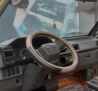 Бежевый Мицубиси L 300, объемом двигателя 2 л и пробегом 306 тыс. км за 3900 $, фото 6 на Automoto.ua