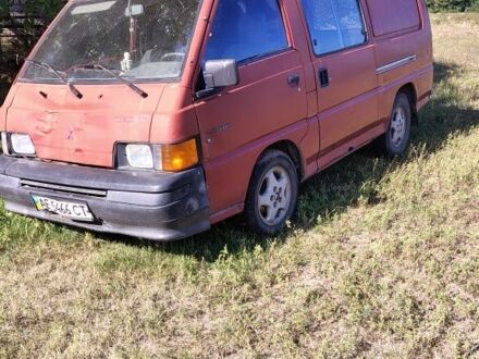 Красный Мицубиси L 300, объемом двигателя 2.5 л и пробегом 300 тыс. км за 1932 $, фото 1 на Automoto.ua