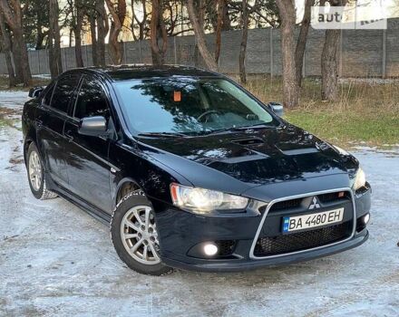 Черный Мицубиси Lancer Ralliart, объемом двигателя 2 л и пробегом 149 тыс. км за 10600 $, фото 1 на Automoto.ua