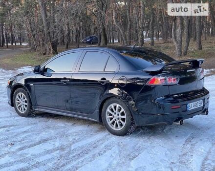 Черный Мицубиси Lancer Ralliart, объемом двигателя 2 л и пробегом 149 тыс. км за 10600 $, фото 70 на Automoto.ua