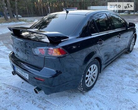 Черный Мицубиси Lancer Ralliart, объемом двигателя 2 л и пробегом 149 тыс. км за 10600 $, фото 71 на Automoto.ua