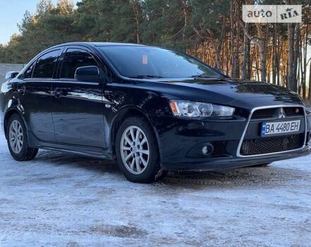 Черный Мицубиси Lancer Ralliart, объемом двигателя 2 л и пробегом 149 тыс. км за 10600 $, фото 26 на Automoto.ua