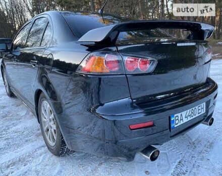 Чорний Міцубісі Lancer Ralliart, об'ємом двигуна 2 л та пробігом 149 тис. км за 10600 $, фото 81 на Automoto.ua